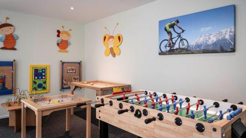 a play room with a large chess board at die berge lifestyle-hotel Sölden in Sölden