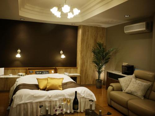 Uma cama ou camas num quarto em Hotel LEXY旧Tsubakikan Adult Only