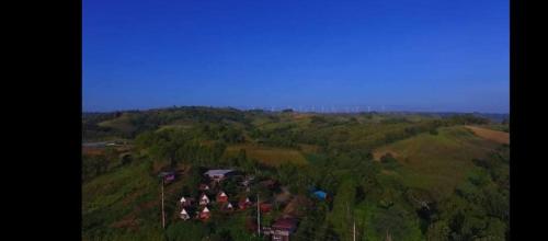 an aerial view of a hill with houses and trees at เขาค้อ อันนาอิม รีสอร์ท in Ban Thung Samoe