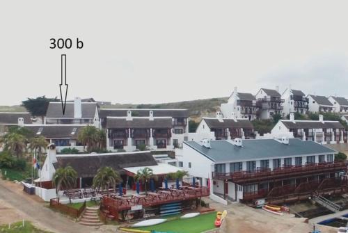 an aerial view of a town with houses at Luxury Breede River View at Witsand- 300B Self-Catering Apartment in Witsand