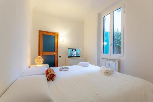 Posteľ alebo postele v izbe v ubytovaní L'APPARTEMENT DE PAOLO