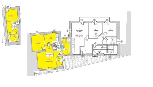 a floor plan of a building with yellow at Appartamenti Dany in Arabba