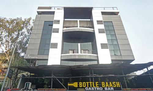 a building with a sign in front of it at The Elite Suites in Pune