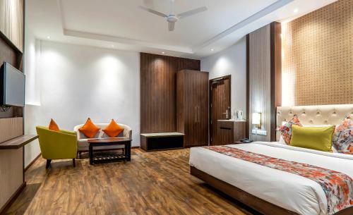Katil atau katil-katil dalam bilik di Hotel Le ROI Lake View Koti