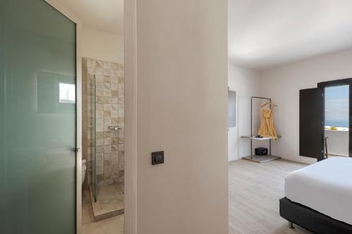 Letto o letti in una camera di Pearl Inn Hotel by Pearl Hotel Collection