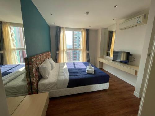 Ein Bett oder Betten in einem Zimmer der Unterkunft Grande Caribbean Condo Resort TLH