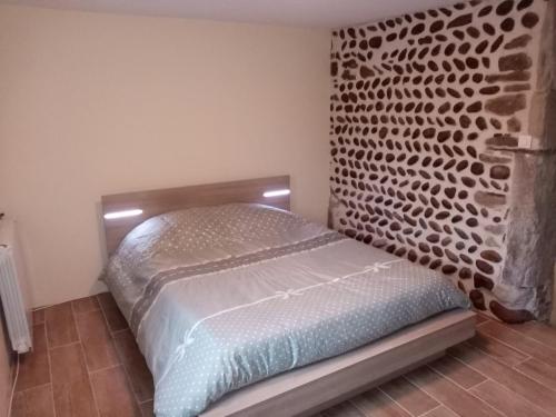 Säng eller sängar i ett rum på Les Sentiers Drômois