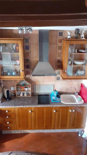 Kuchyň nebo kuchyňský kout v ubytování La casita azul