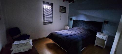 Ένα ή περισσότερα κρεβάτια σε δωμάτιο στο Merlo2