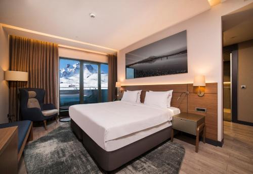 Ένα ή περισσότερα κρεβάτια σε δωμάτιο στο Radisson Blu Hotel, Mount Erciyes
