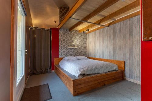 Säng eller sängar i ett rum på Domaine Sur-Valot