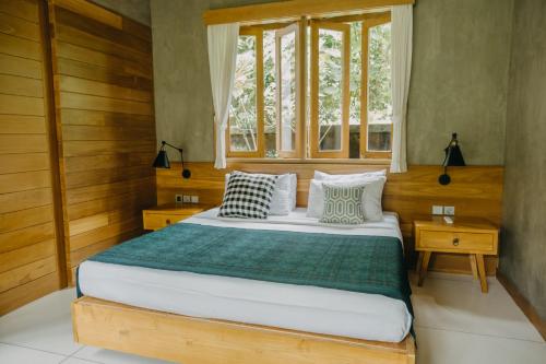 Wana Karsa Ubud Hotelにあるベッド