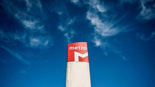 a red and white pole with a n sign on it at Lisbon City Hollywood Hotel by City Hotels in Lisbon