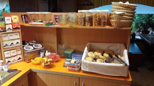 a kitchen counter with a box of food on it at Verwöhn-Pension Wiesengrund in Bischofsgrün