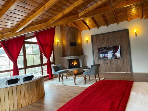 TV a/nebo společenská místnost v ubytování River Didi Otel