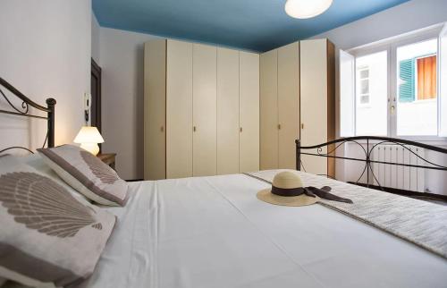 Un ou plusieurs lits dans un hébergement de l'établissement Alghero appartamento Medina per 6 ospiti in centro storico