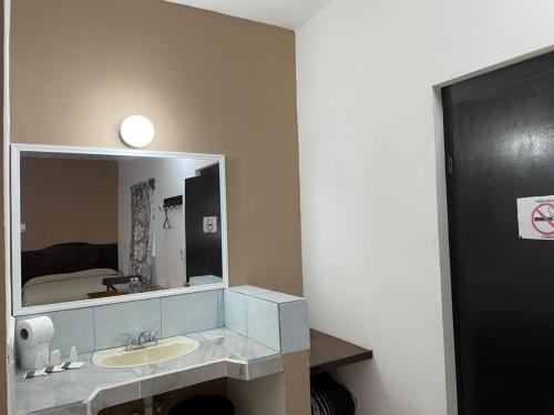 Koupelna v ubytování Hotel Moreno