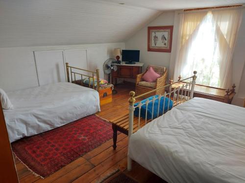 Postel nebo postele na pokoji v ubytování Die Heemhuis