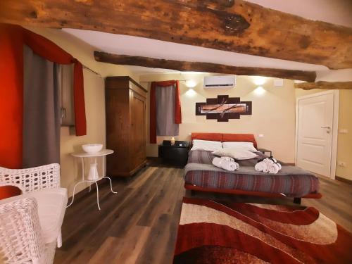 La TERRAZZA fra le TORRI 객실 침대