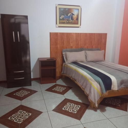 Postel nebo postele na pokoji v ubytování Hostal Luren