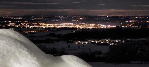 a pile of snow on top of a mountain at night at Mont Blanc Chalet in Grandevent