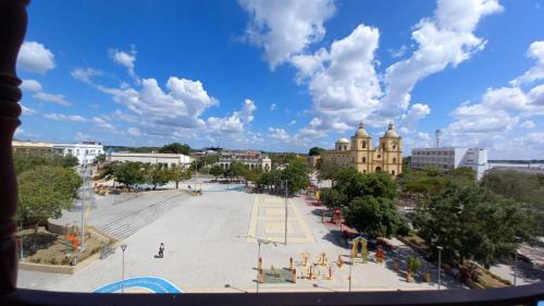 a view of a large playground in a city at Perla De La Sabana in Corozal