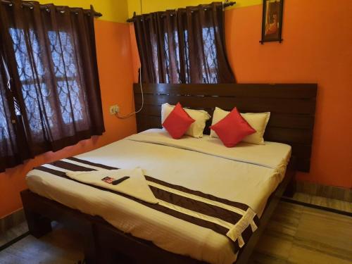 Ένα ή περισσότερα κρεβάτια σε δωμάτιο στο Holiday Rental Rooms