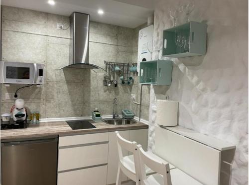 Η κουζίνα ή μικρή κουζίνα στο Loft Ben A Ocaz