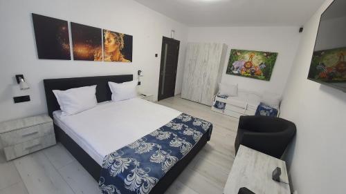 Ένα ή περισσότερα κρεβάτια σε δωμάτιο στο Apartament Fodor