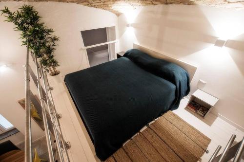 Posteľ alebo postele v izbe v ubytovaní Beautifully Renovated Loft in Trastevere