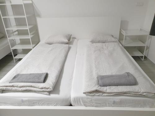 Ліжко або ліжка в номері Betariel Apartments M12