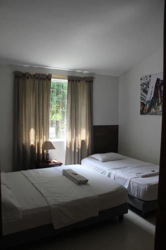 Cama ou camas em um quarto em Quinta Baroe
