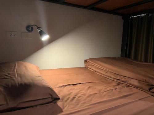 Ένα ή περισσότερα κρεβάτια σε δωμάτιο στο Litera Hostel