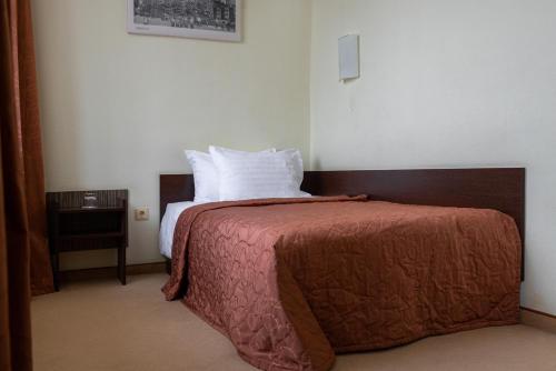 
Кровать или кровати в номере Отель Неман
