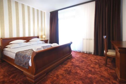 Katil atau katil-katil dalam bilik di Hotel Moldavia