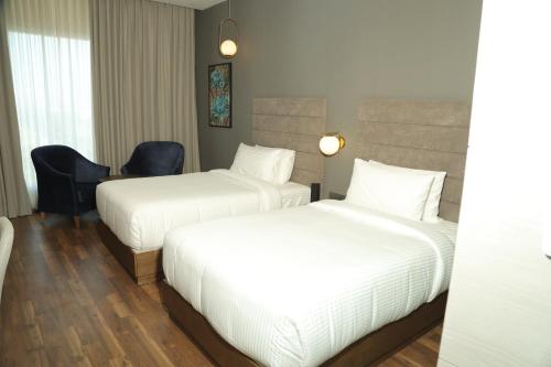 Wyndham Chandigarh Mohaliにあるベッド