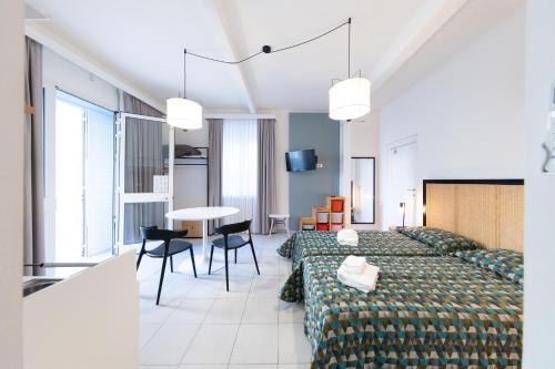 Posteľ alebo postele v izbe v ubytovaní Via Siena 4 - Suites & Rooms