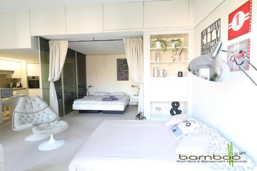 Voodi või voodid majutusasutuse Bamboo Milano Papiniano Loft toas