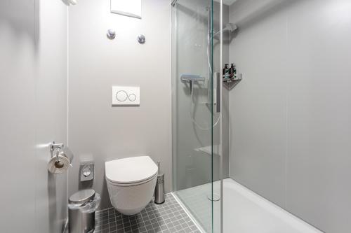 Koupelna v ubytování Hotel Piz Mitgel