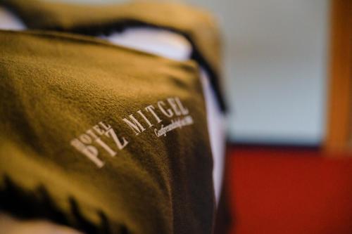 a close up of the words new mexico written on the side at Hotel Piz Mitgel in Savognin