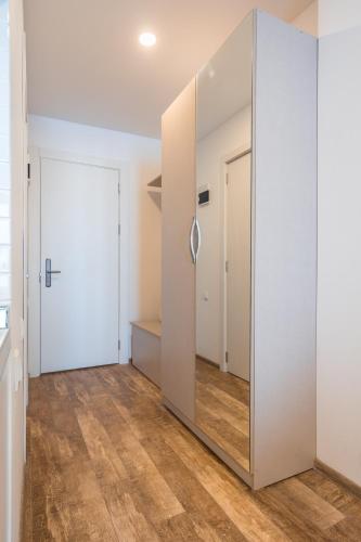 an empty room with a mirror and a closet at GVC 240 New Gudauri in Gudauri