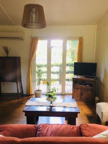 a living room with a couch and a coffee table at Verde Lujan Delta in Tigre