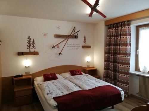 Postel nebo postele na pokoji v ubytování Hotel Aida