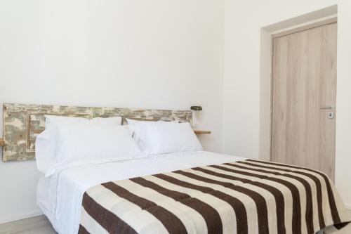 Ένα ή περισσότερα κρεβάτια σε δωμάτιο στο Agriturismo Belvedere 9