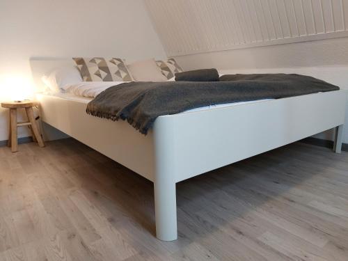 En eller flere senge i et værelse på Haus Meeresbrise