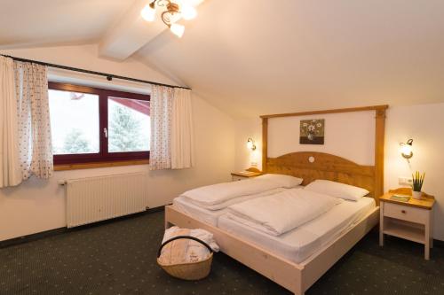 Postel nebo postele na pokoji v ubytování Hotel Hellweger