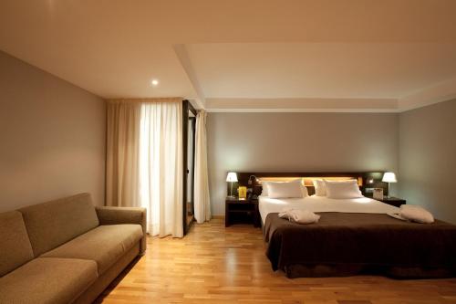Postel nebo postele na pokoji v ubytování Hotel Concordia Barcelona