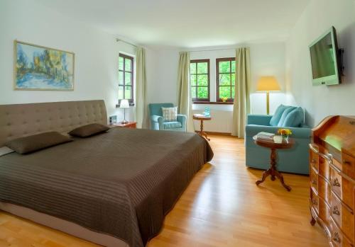 Säng eller sängar i ett rum på Landgasthof Geiersmühle