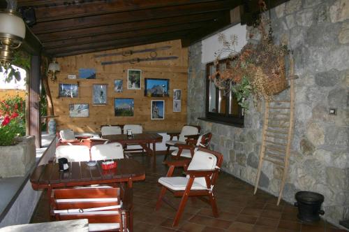 Ein Restaurant oder anderes Speiselokal in der Unterkunft Albergo Martinet 