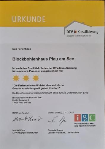 a document with a dkx resettlementettlementettlementettlementettlementettlementettlementettlement certificate at Blockbohlenhaus Plau am See in Plau am See